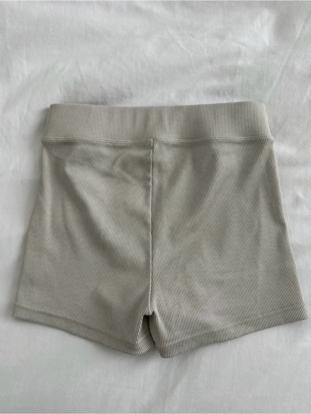 ALO Yoga Ribbed High-Rise Bike Shorts in Light Beige
